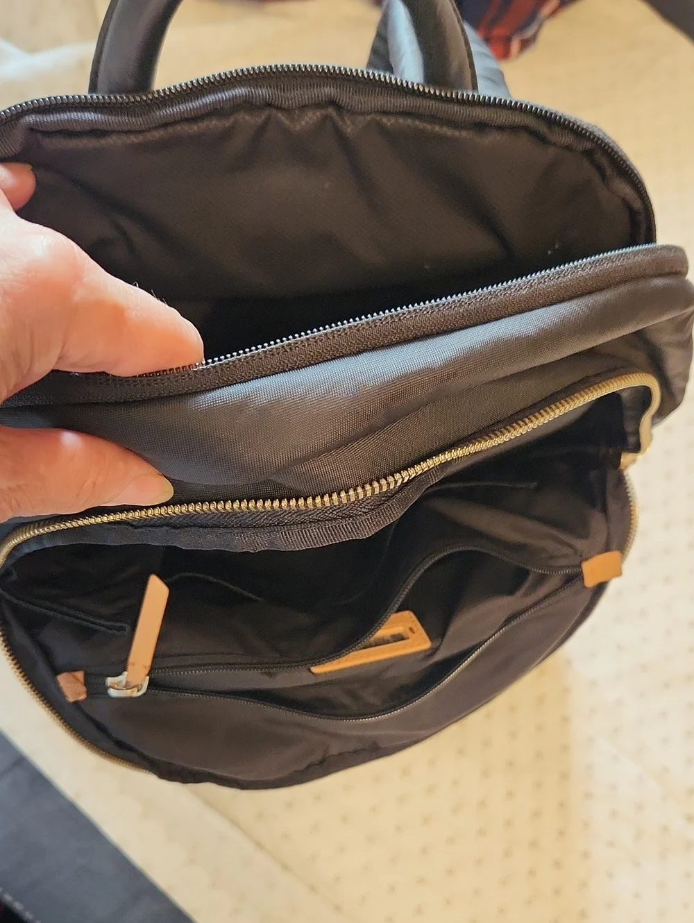 Tumi Voyager Harper Black Backpack with Tan Leather Accents
